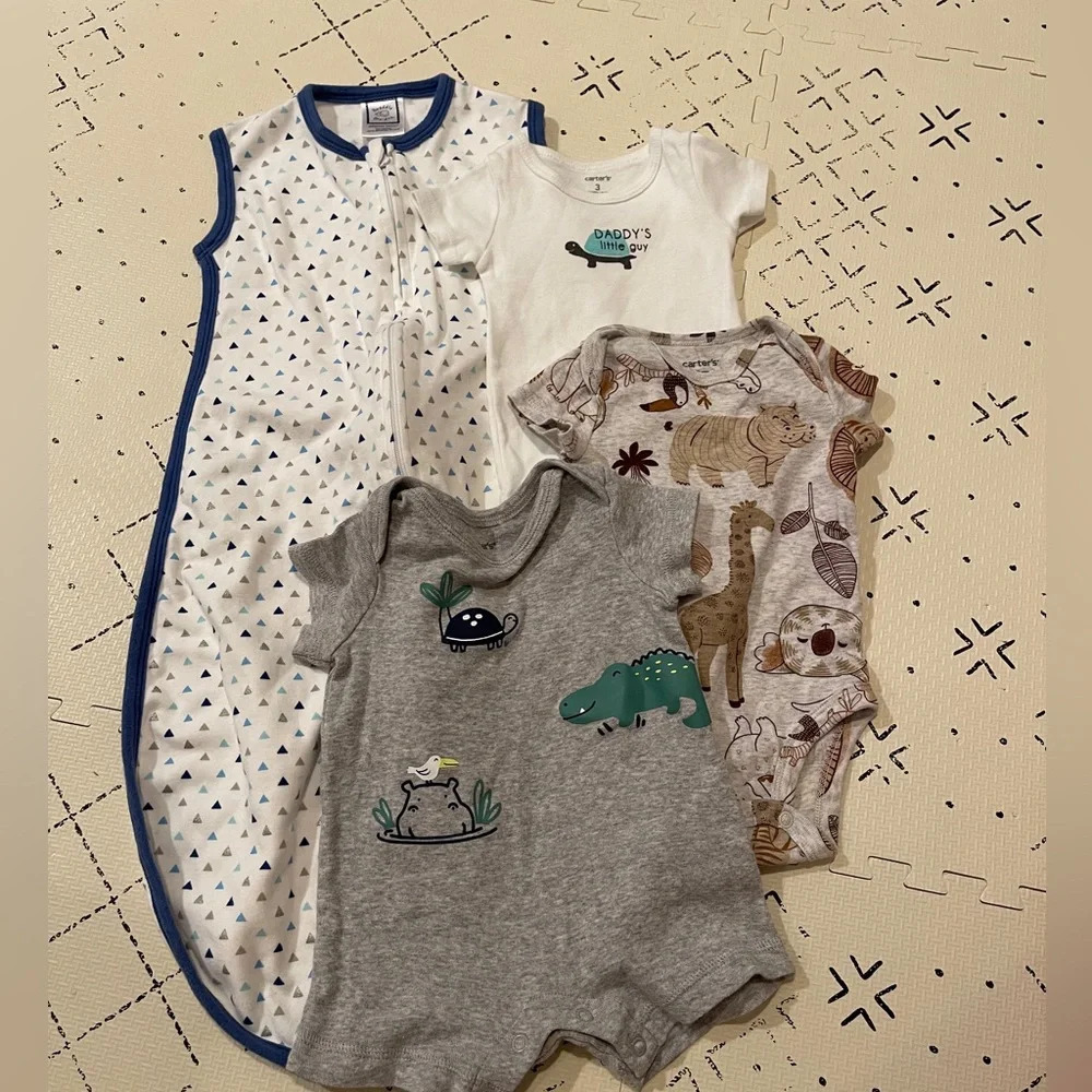 Bundle of baby boy onesies and sleeping sack 3M